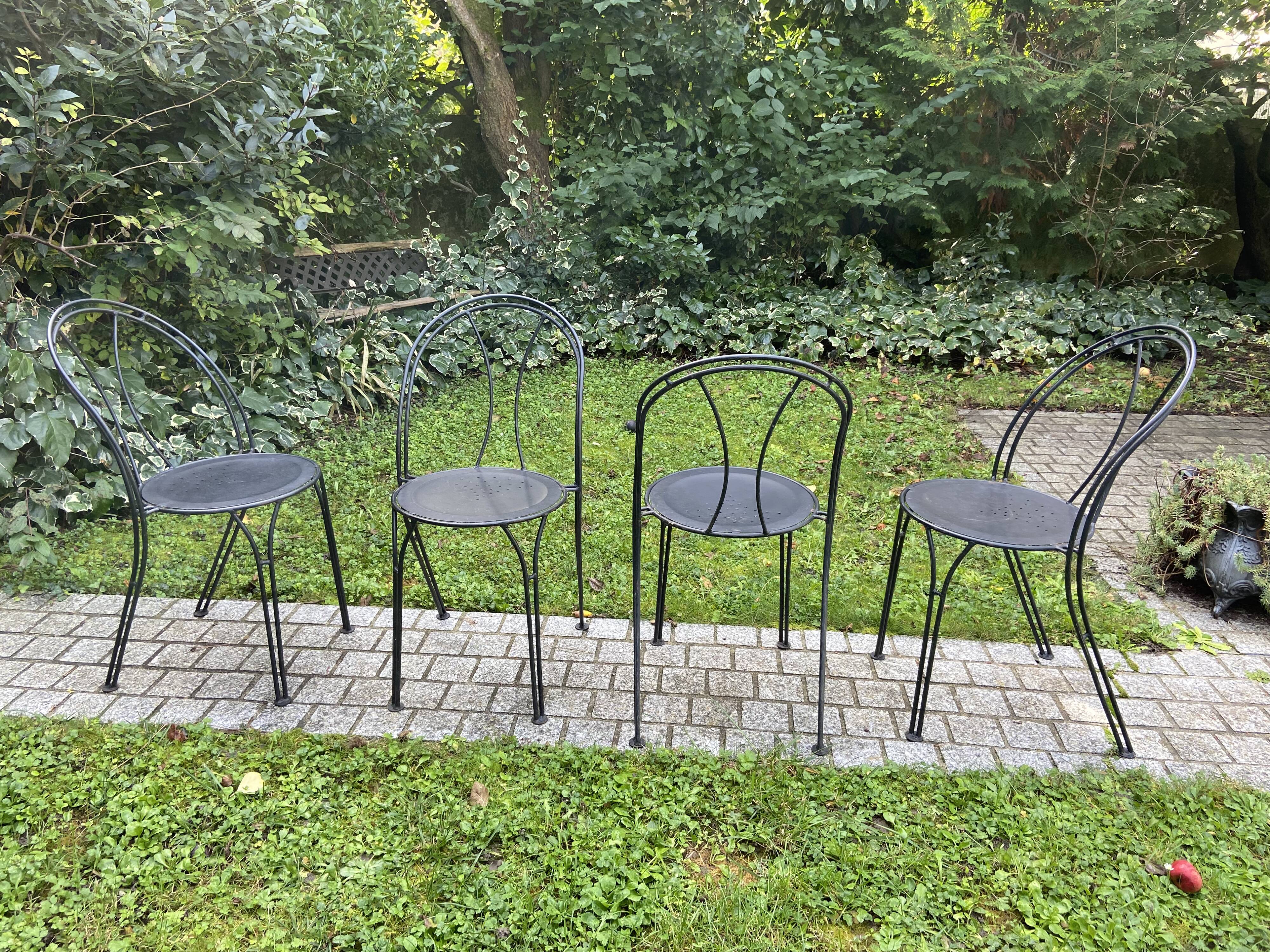 Black chair in vintage wrought iron 1980