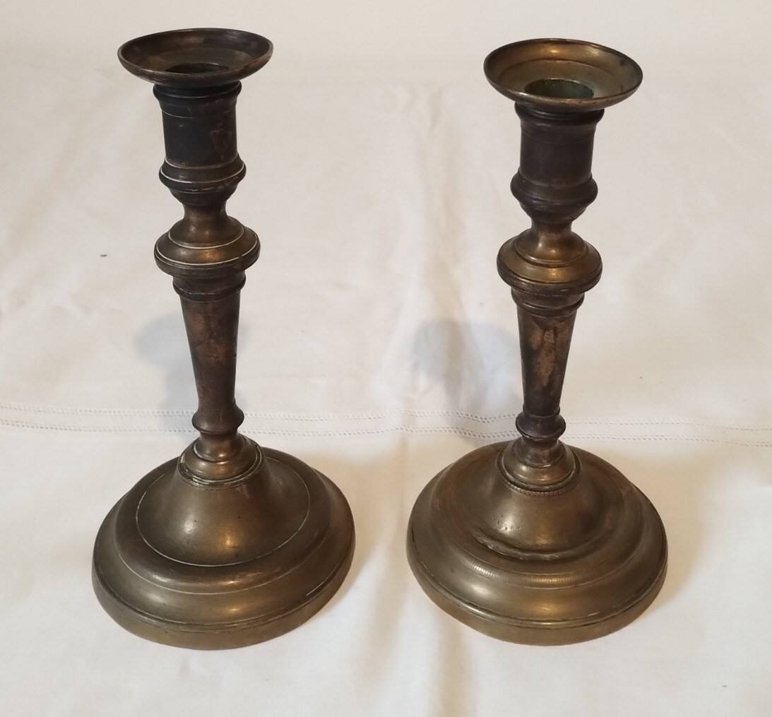 Pair of solid brass candlesticks