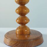 Vintage mid-century wooden candlestick, spool decoration from the 1970s.