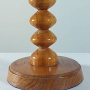 Vintage mid-century wooden candlestick, spool decoration from the 1970s.