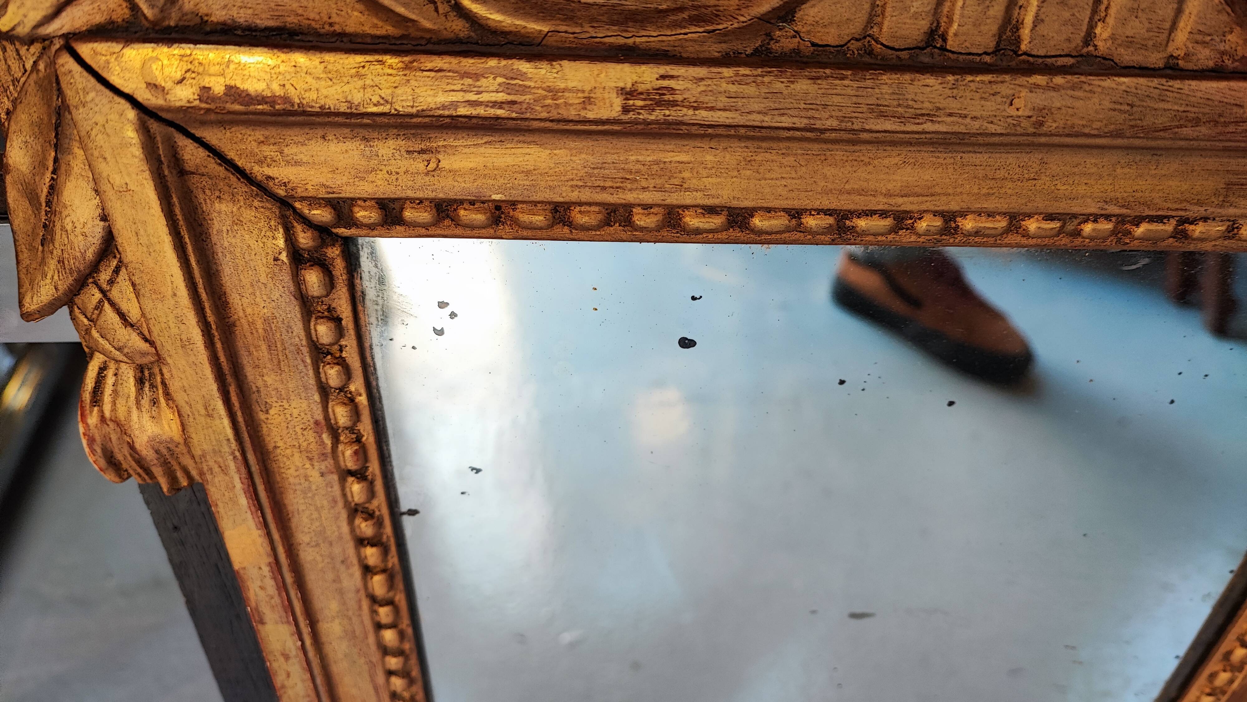 Louis XIV mirror in carved gilded wood, 18th century - 75 cm