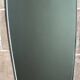 Vintage 1960 free-form mirror known as a retro mirror with a gold and black metal trim.