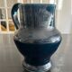 blue pitcher the potter chin