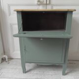 Meuble vintage en vert fumé, plateau bois.