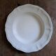 Set of 9 Sarguemines ivory soup plates