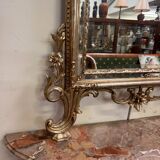 Important console table with a curved shape + Louis XV style mirror in gilded and silvered wood.