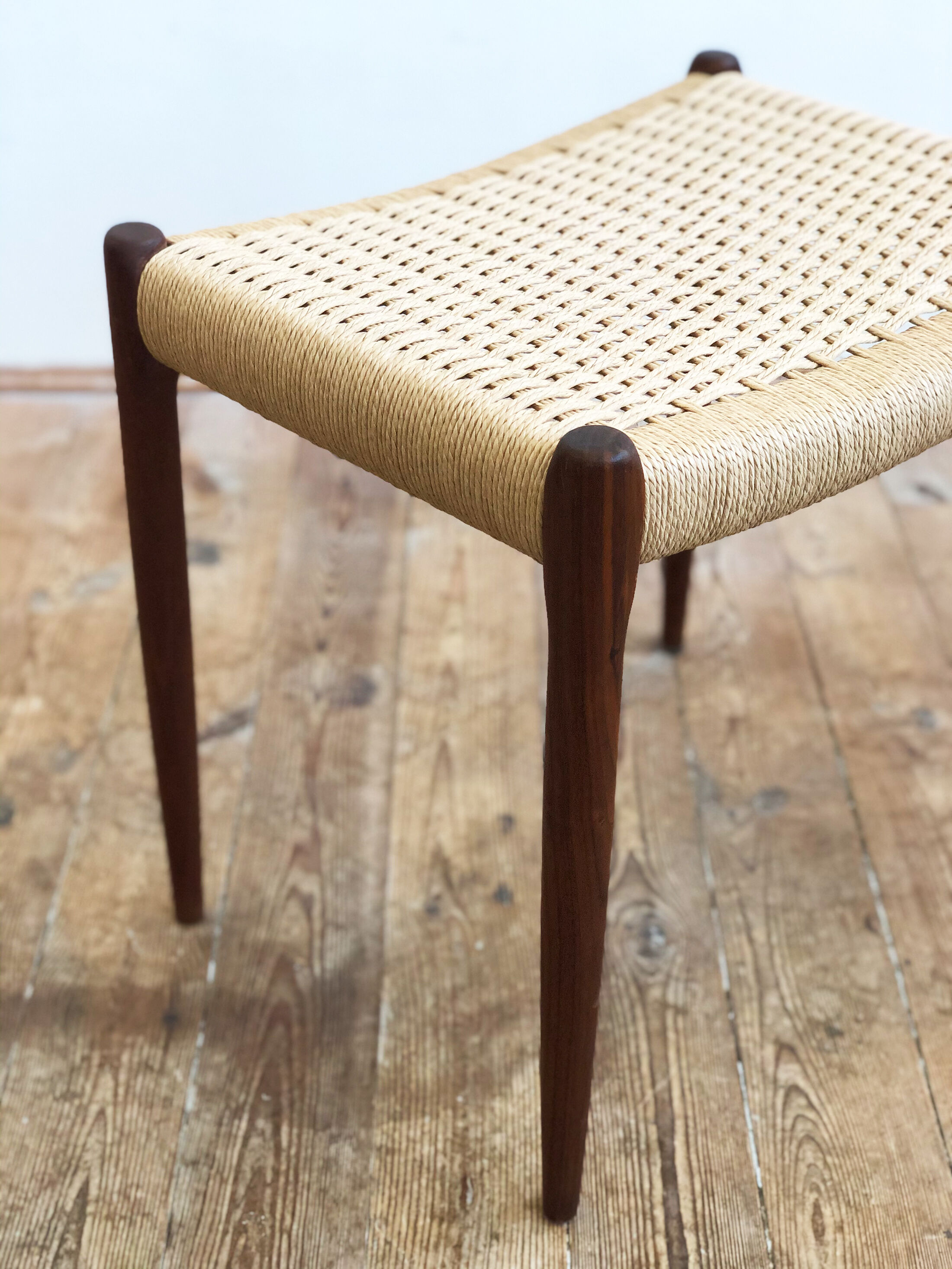 Danish midcentury walnut stool, model 80A by Niels O. Møller with papercord seat