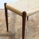 Danish midcentury walnut stool, model 80A by Niels O. Møller with papercord seat