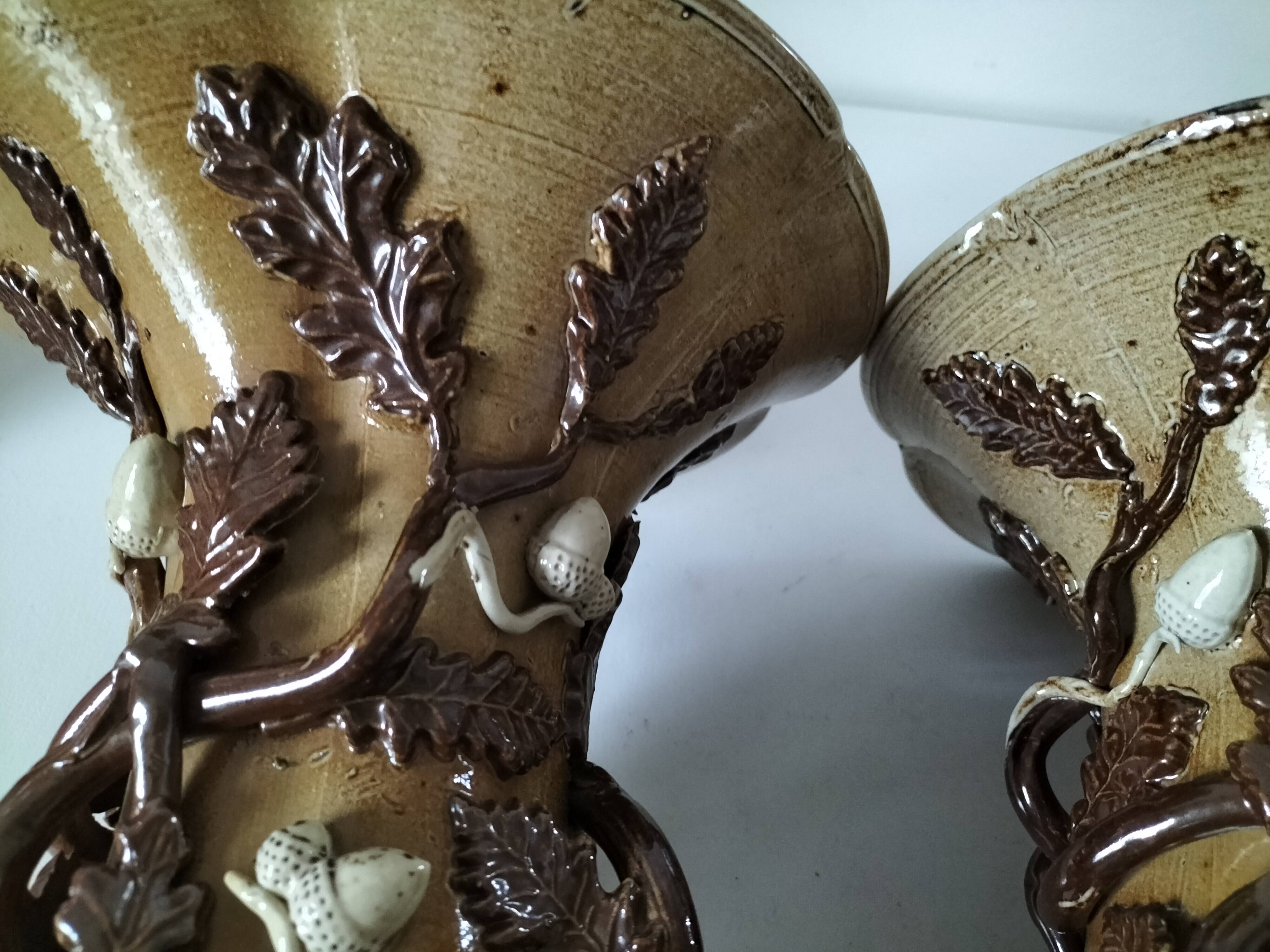 Duo of naturalistic stoneware vases – oak branches & acorns in relief