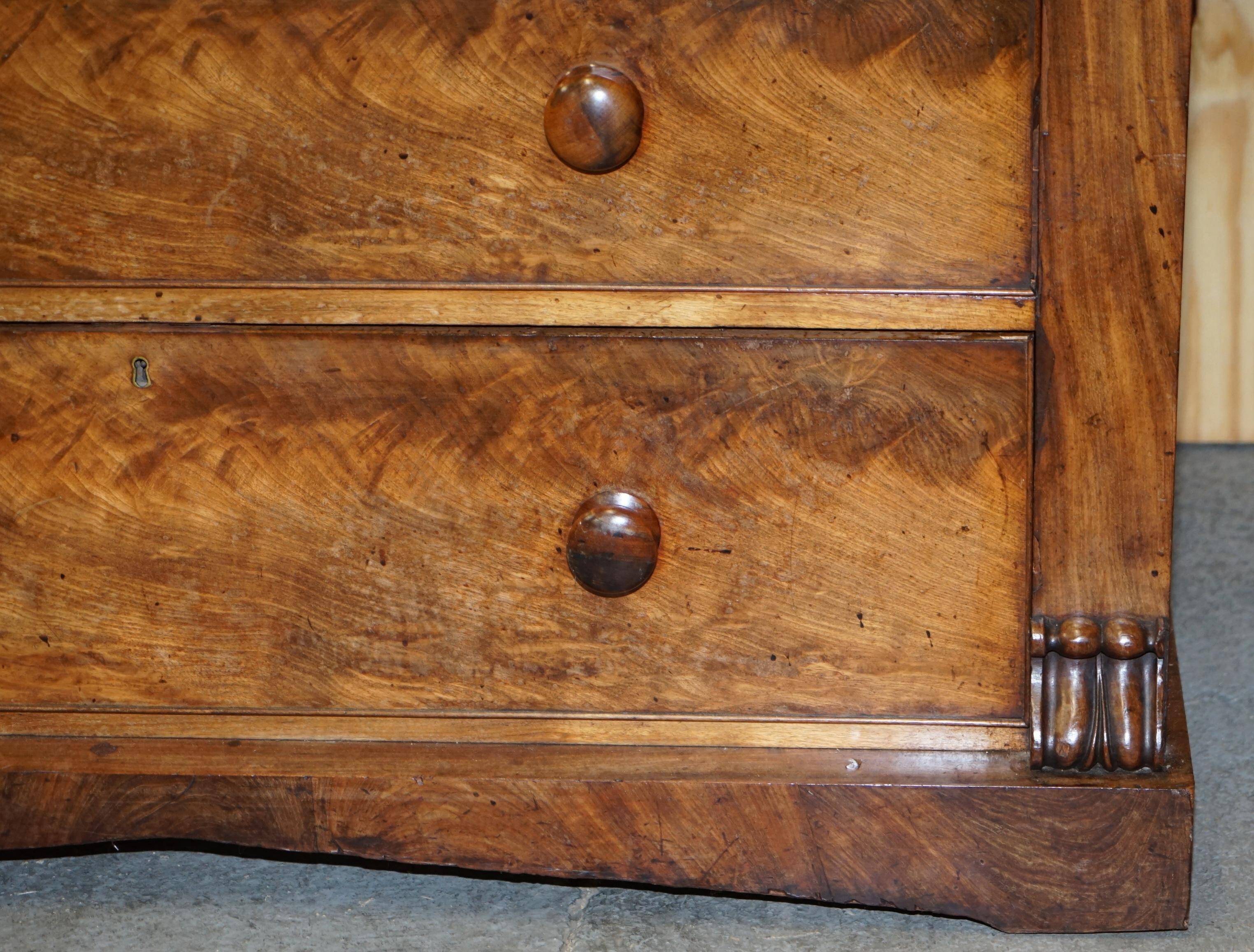 Victorian flamed hardwood commode from the 19th century with a hidden drawer.