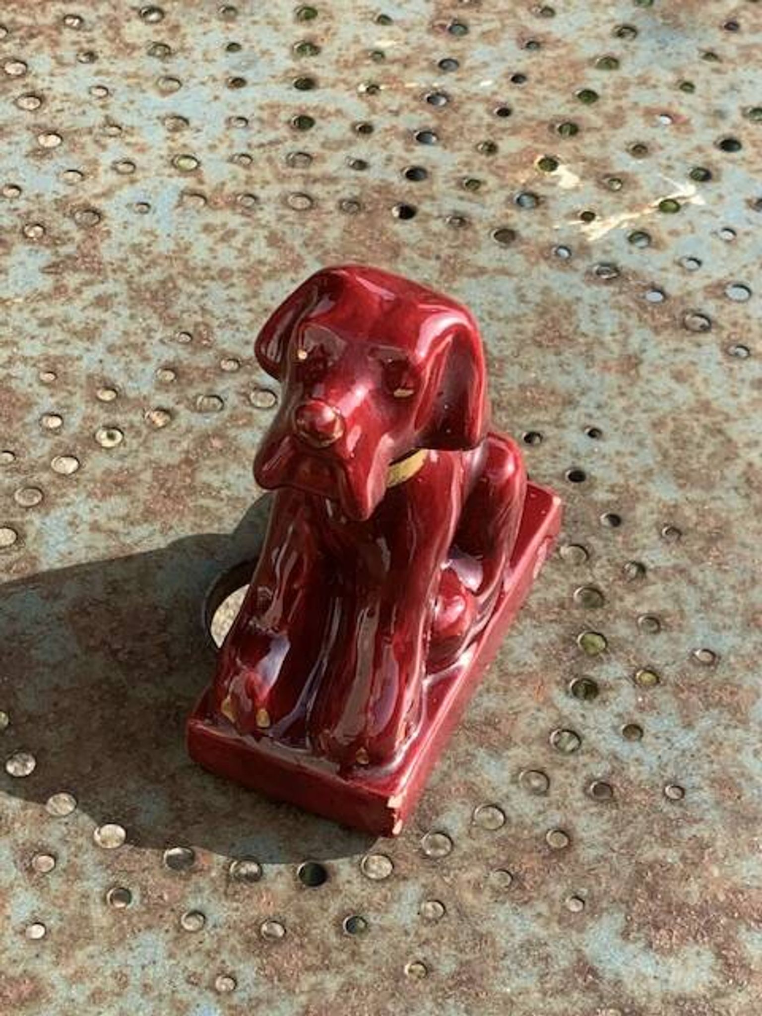 Dog sign CAB in vintage burgundy red enameled ceramic slip, art deco