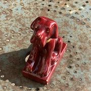 Dog sign CAB in vintage burgundy red enameled ceramic slip, art deco