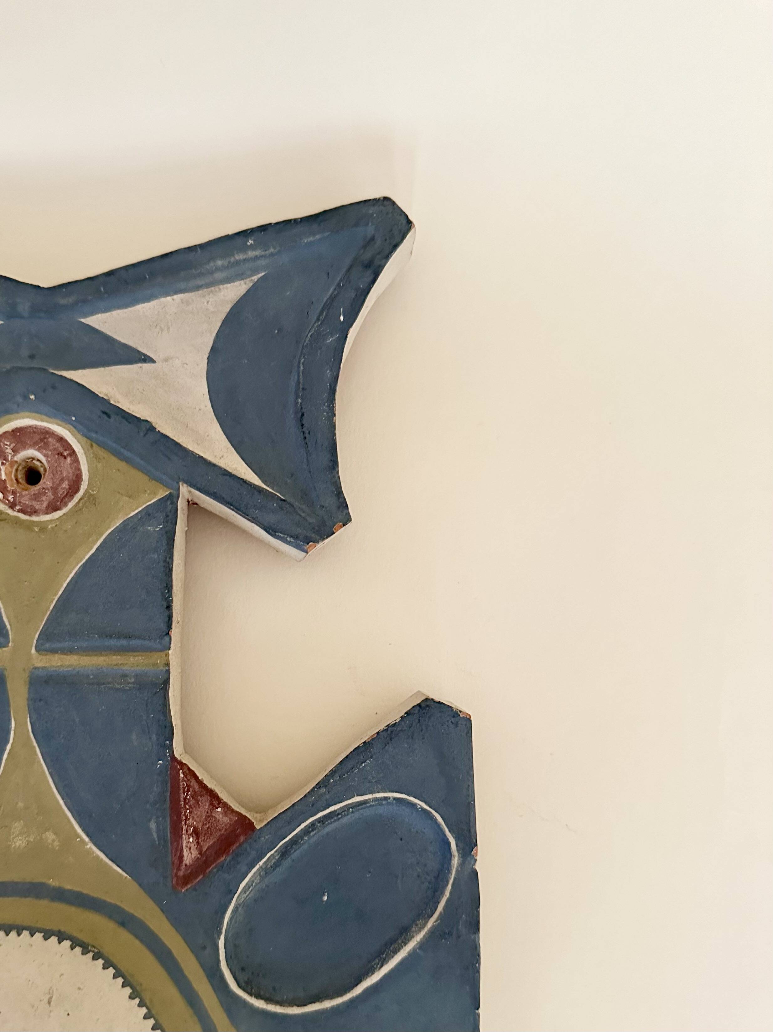 Painted terracotta wall mask