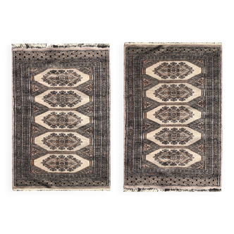 Pair of handmade Pakistani oriental rugs: 1.04 x 0.64 M