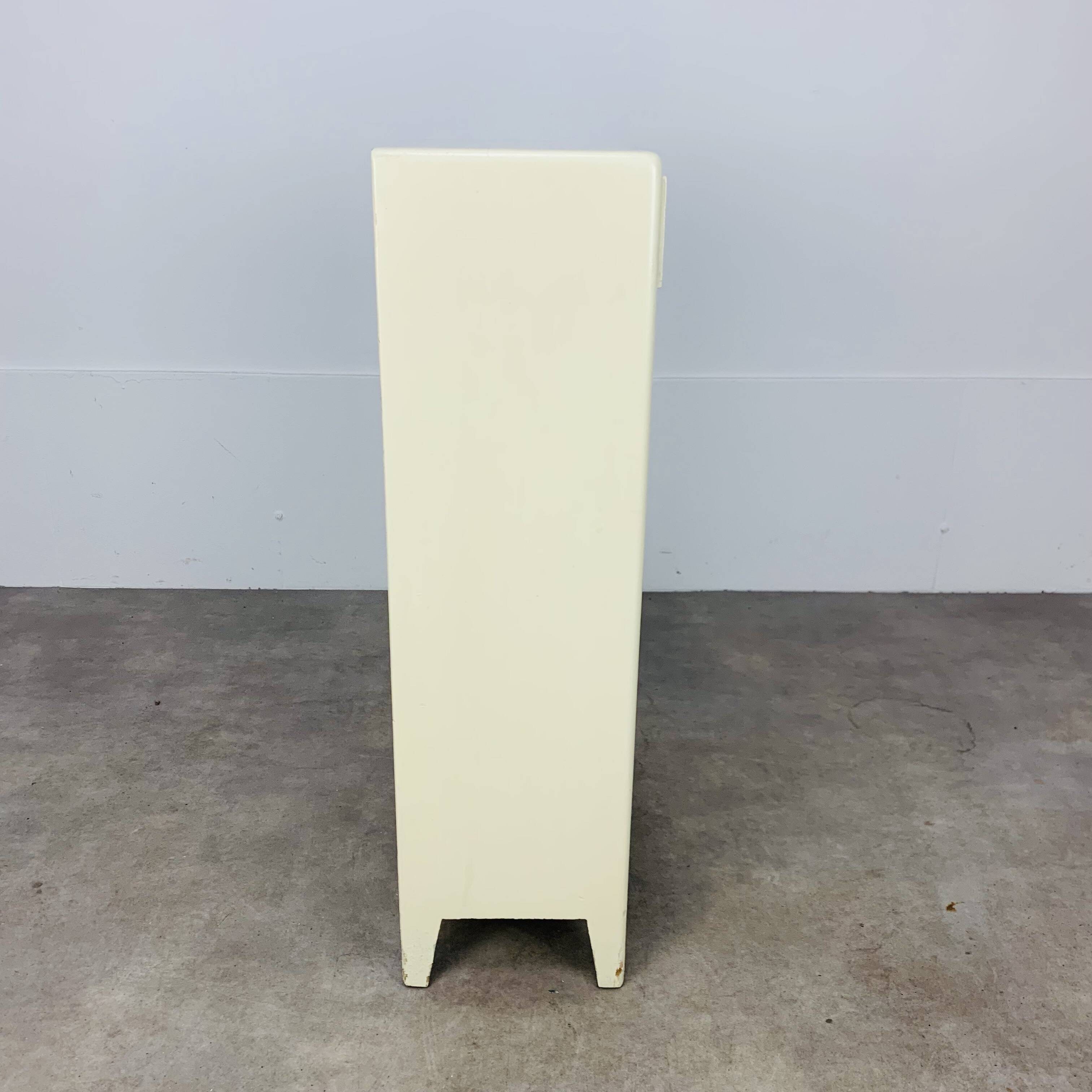 White wood convenient storage unit from the 1950s