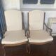 Pair of Louis XV style armchairs in walnut with rush seating.