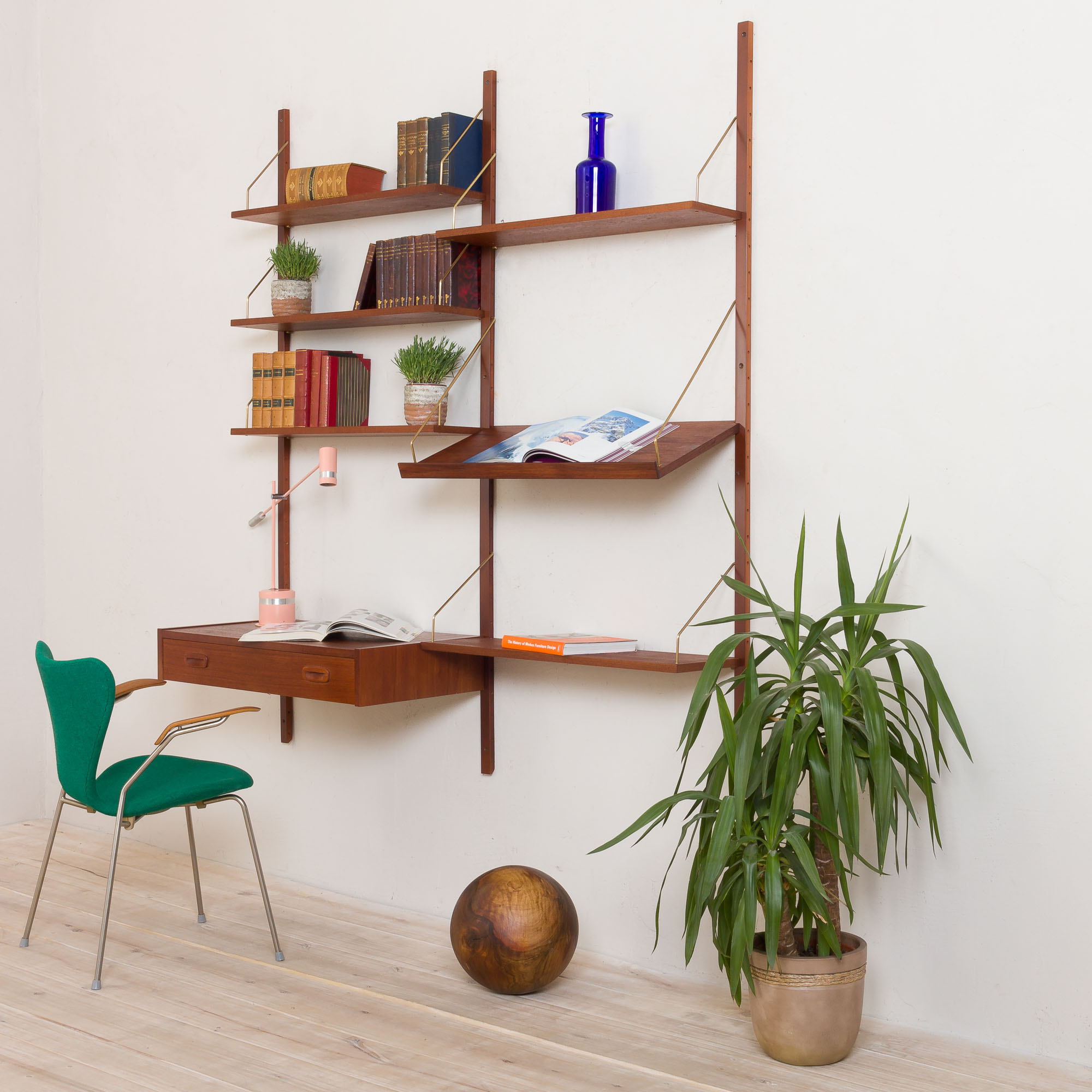 Danish teak wall unit with a desk and magazine tilted shelf