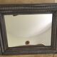 Antique patinated wood mirror