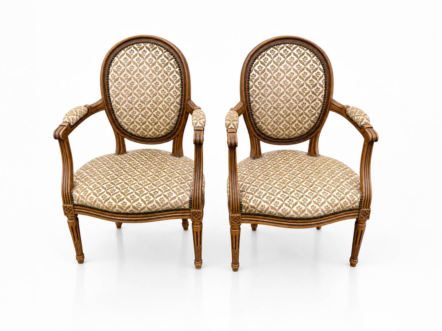 Pair of medallion armchairs in Louis XVI style – carved wood – floral fabric