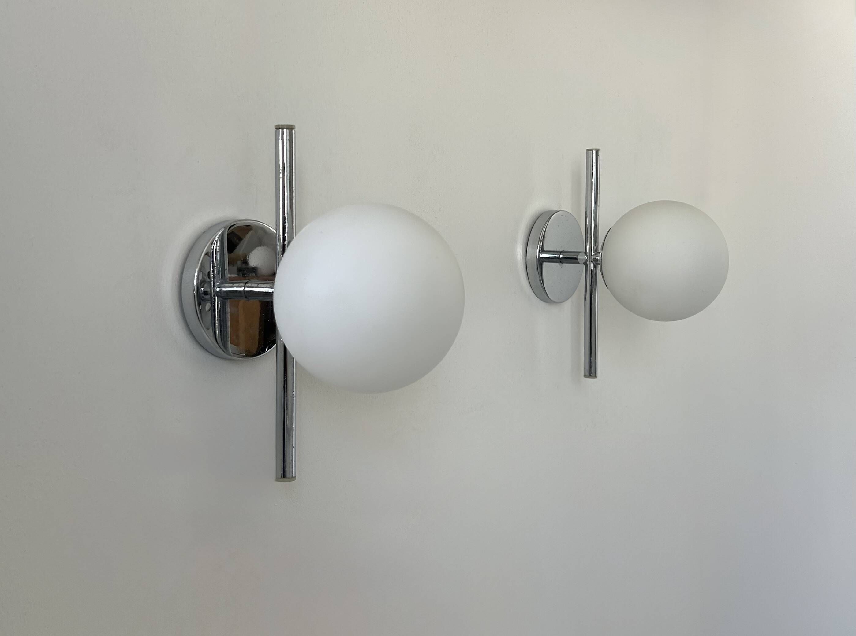 Pair of vintage chrome and opaline wall lights, France 1970.