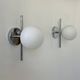 Pair of vintage chrome and opaline wall lights, France 1970.