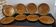 8 vintage Gien France asparagus plates in glazed brown slip