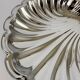Large silver-plated serving dish in the shape of a vintage shell.
