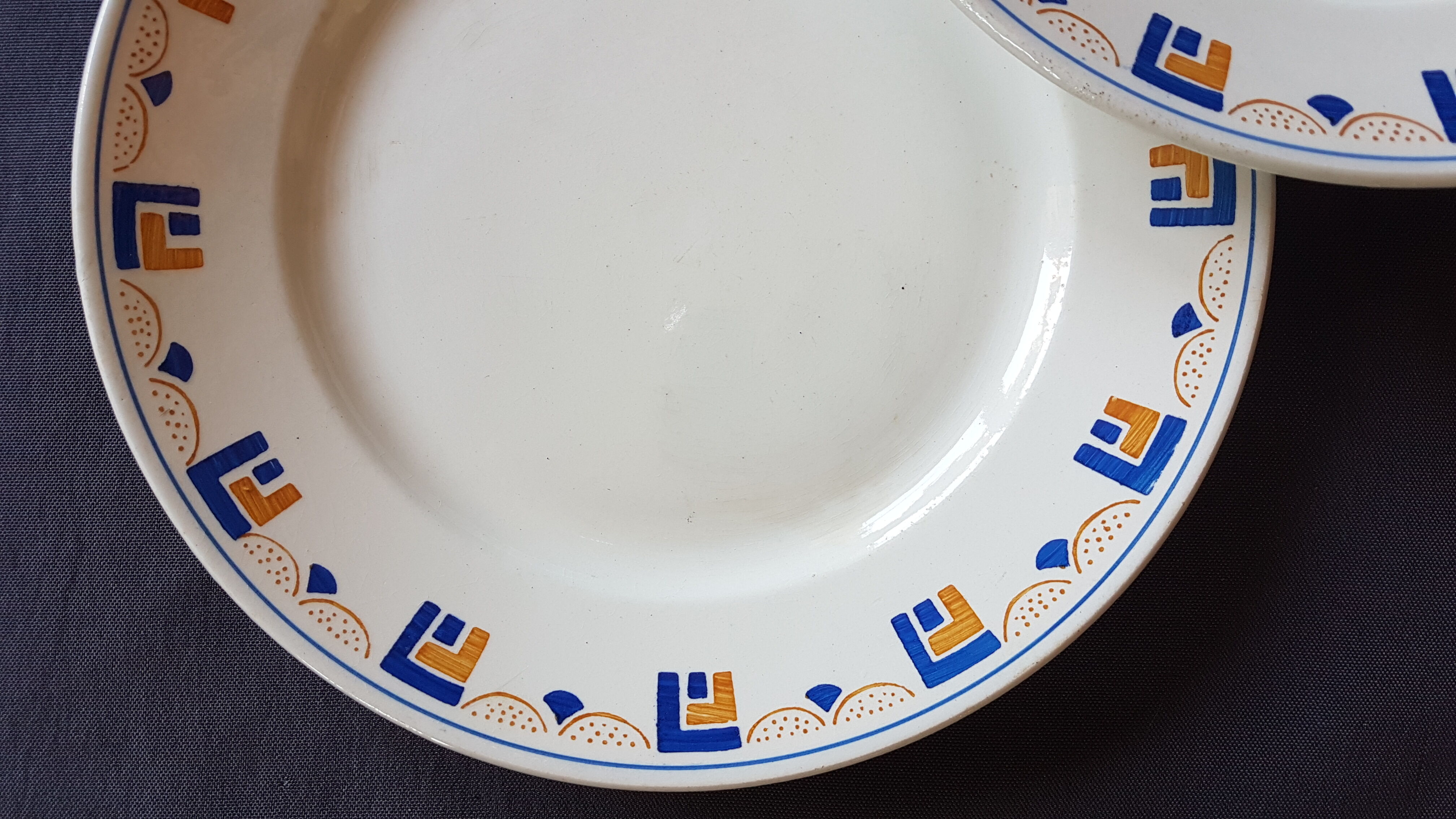Suite of 4 plates made of Lunéville earthenware