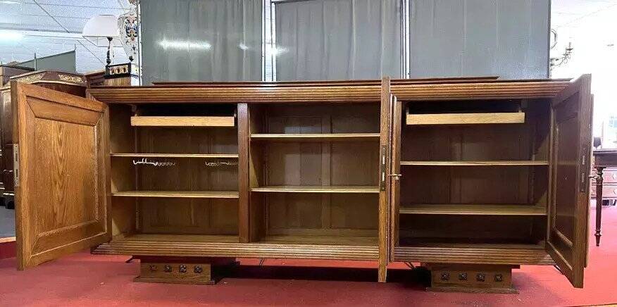 According to Charles Dudouyt: sideboard in a row from the Art Deco period in solid wood.