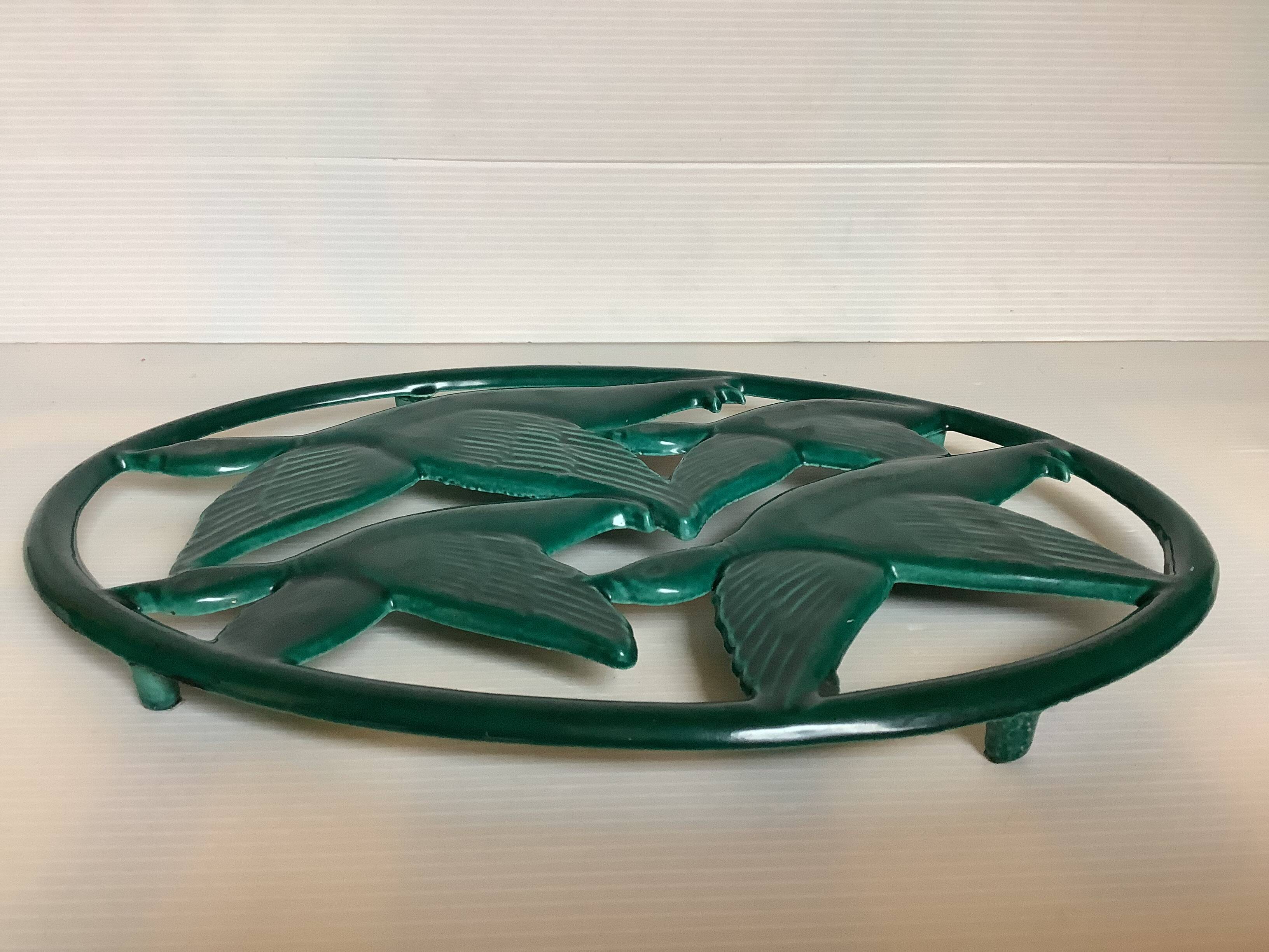 Zoomorphic enameled cast iron trivet