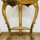 Golden console in Louis XV Rococo style made of resin.