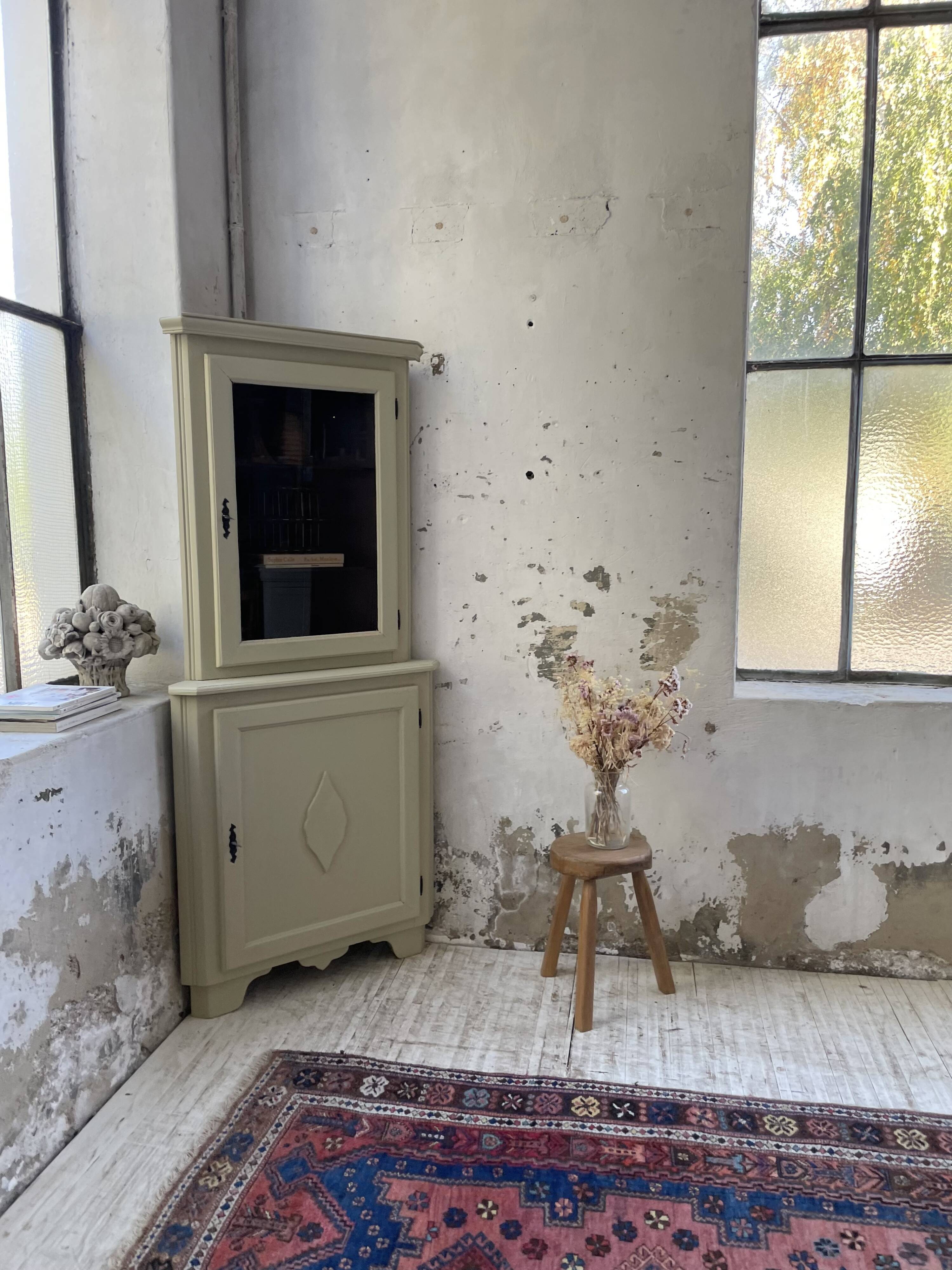 Corner display cabinet from the 1950s