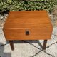 Vintage bedside table from the 60s-70s in teak.