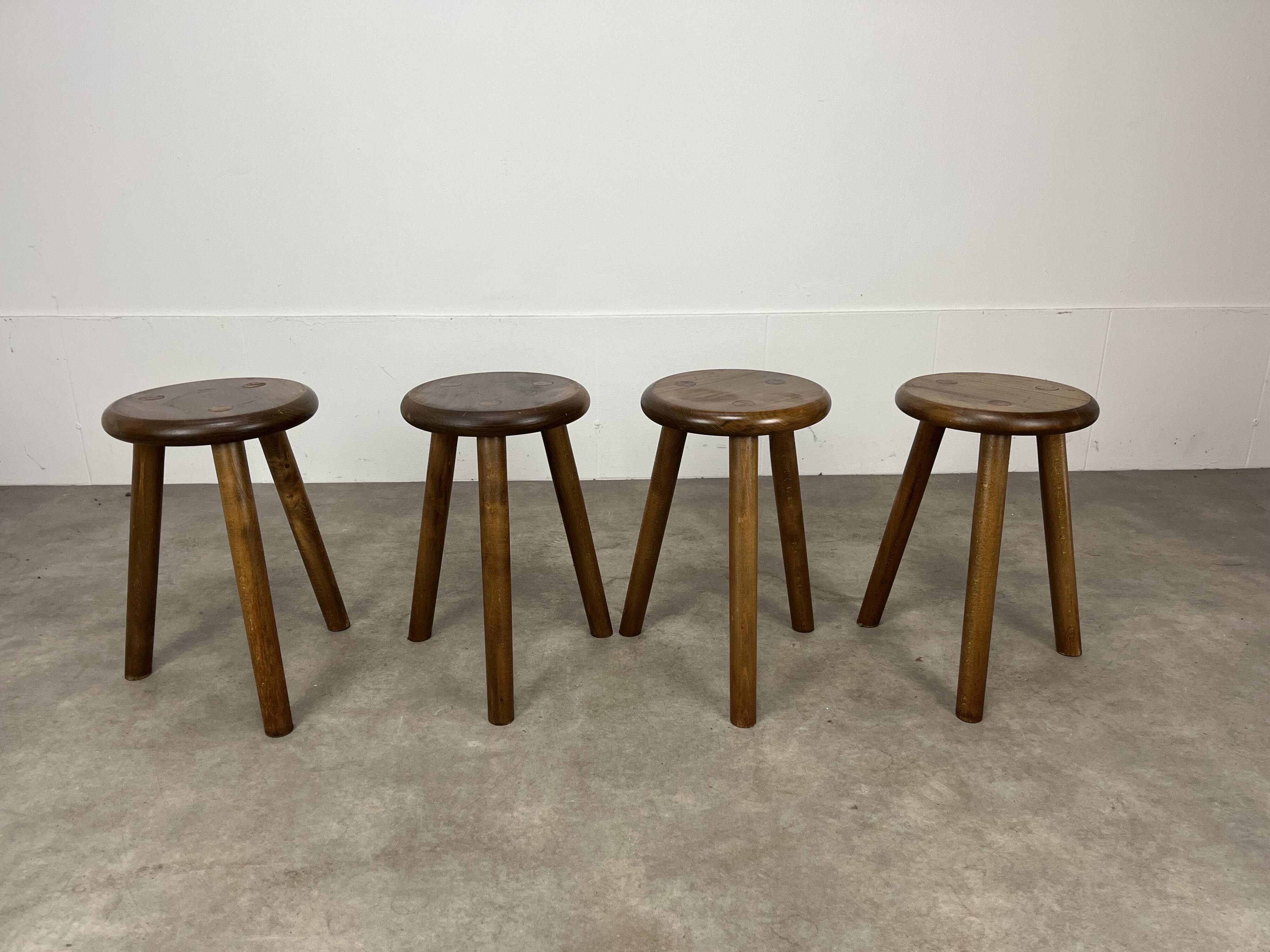 4 wooden tripod stools