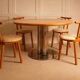 Circular dining table