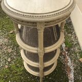 Wooden saddle on three shelves