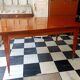 Mid-century vintage coffee table with tapered legs.