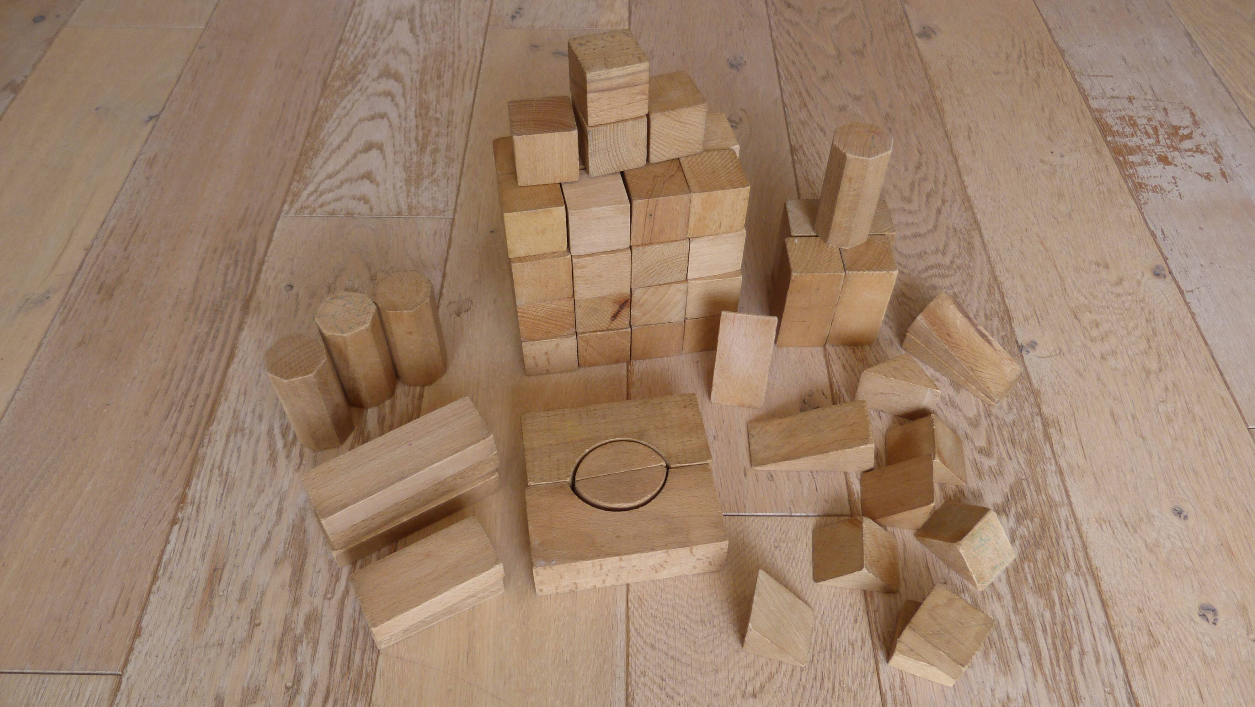 Old raw wood construction game in its cart