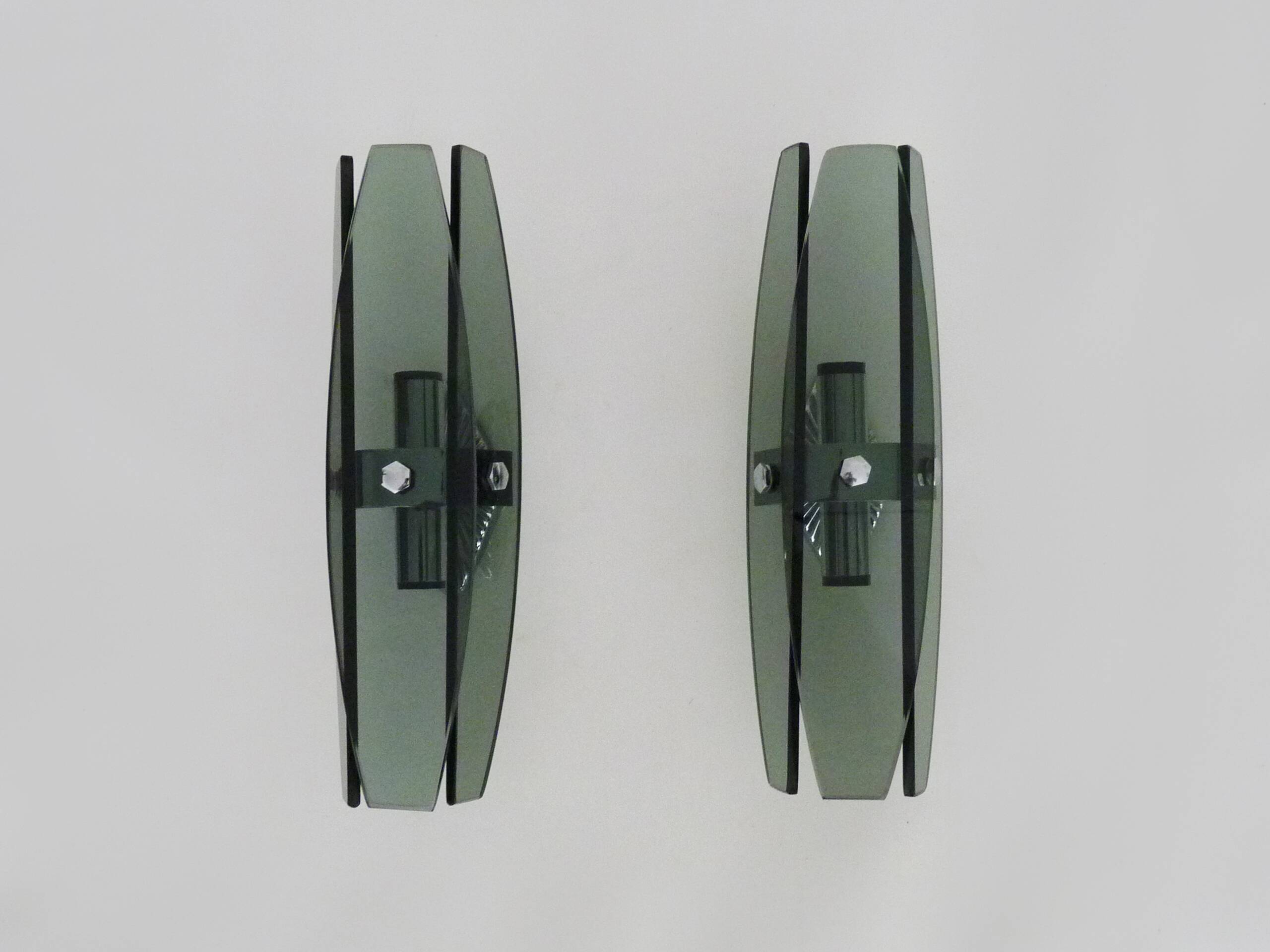 Pair of Italian wall lights Veca Fontana Arte in smoked glass and chrome.