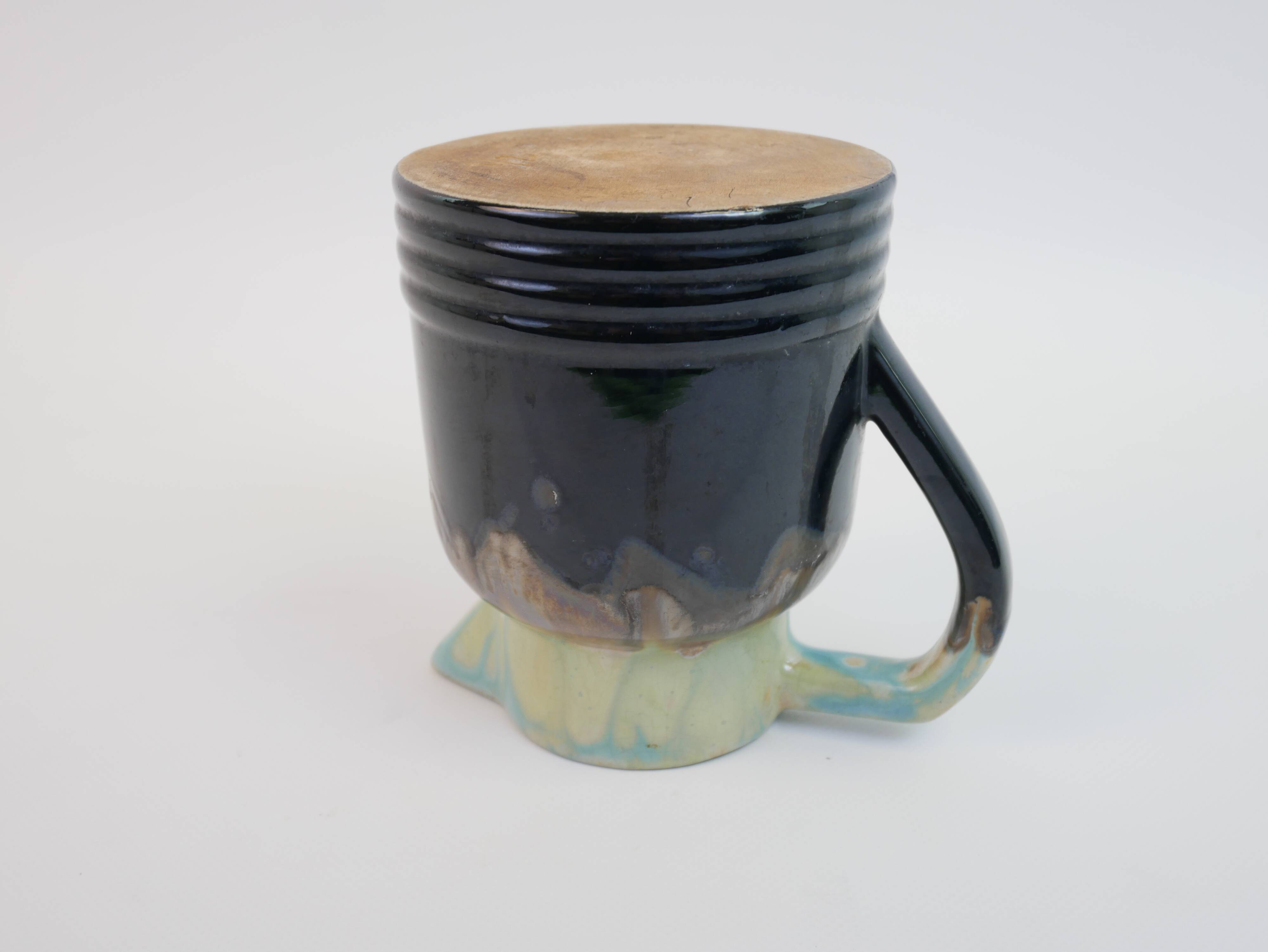 Art Deco pitcher in black, brown and blue glazed ceramic