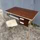 Small vintage desk with formica drawers and 70s chair
