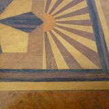 Branded wooden box decorated with suns