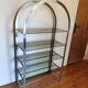 Rounded shelf from the 70s in chrome metal and glass