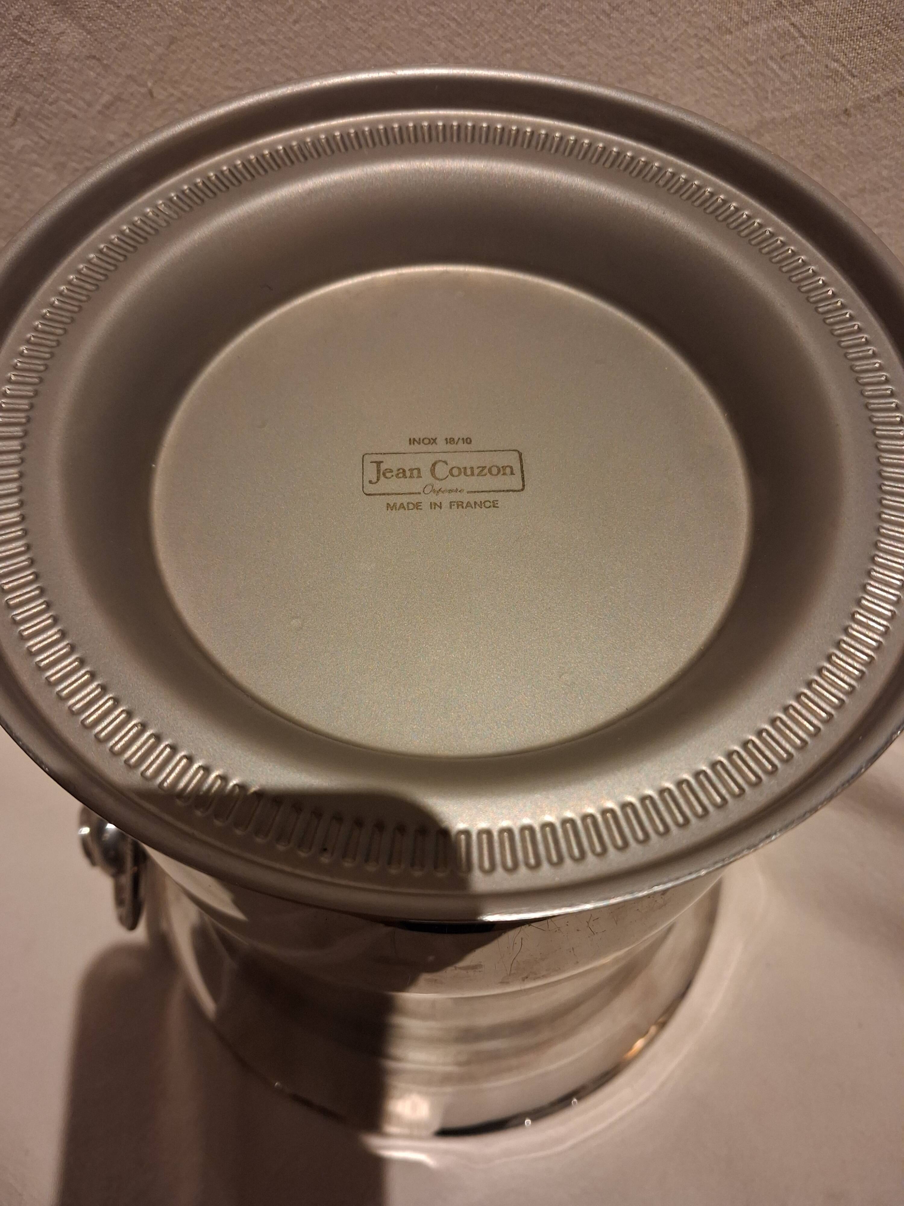 Stainless steel champagne bucket, silversmith Jean Couzon, model on a pedestal.