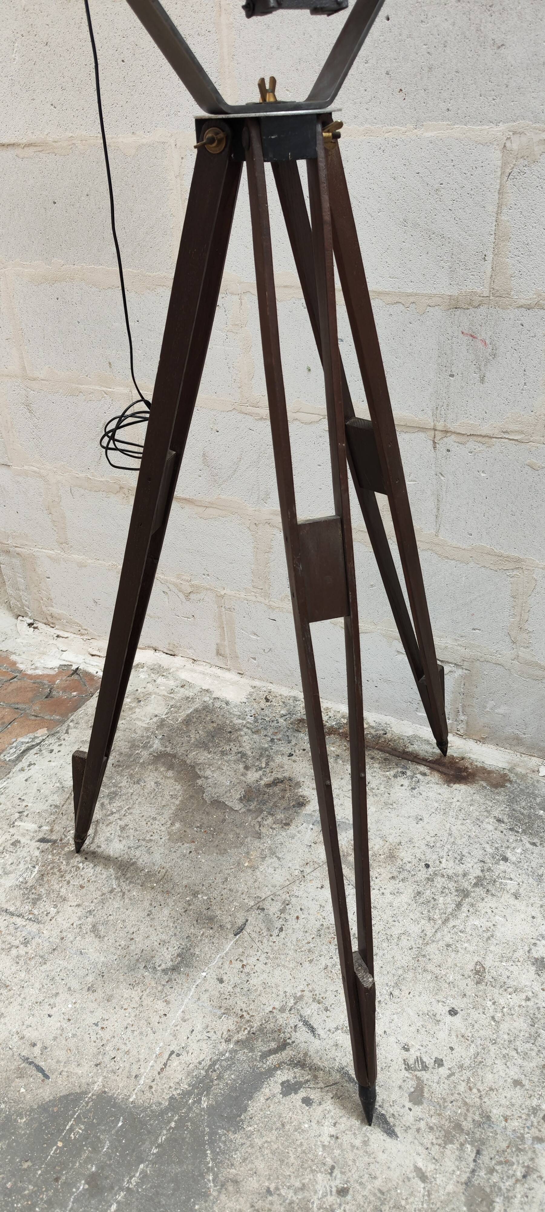 Old Mazda projector on wooden tripod