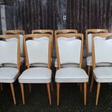 series of 8 vintage skai and wood chairs