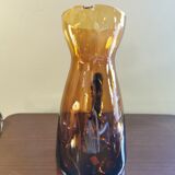 Vintage pitcher in amber glass
