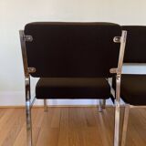 Pair of brown low chairs with chrome base