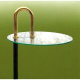 Old designer side table in tempered glass and black and gold metal