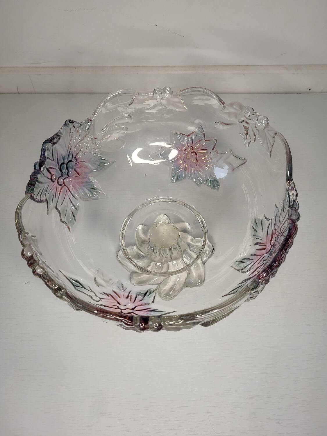 Footed glass fruit bowl